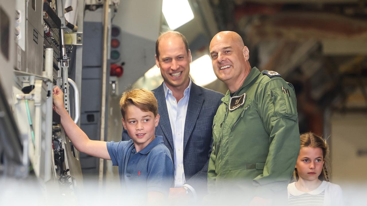 Prince George of Wales raises the ramp on the C17 plane during the visit to the Air Tattoo at RAF Fairford with Prince William, Prince of Wales and Princess Charlotte of Wales on July 14, 2023 in Fairford, England. (Photo by Chris Jackson/Getty Images)