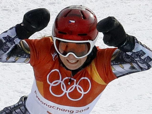 Gold medal winner Ester Ledecka, of the Czech Republic, runs the course during the women's parallel giant slalom final at Phoenix Snow Park at the 2018 Winter Olympics in Pyeongchang, South Korea, Saturday, Feb. 24, 2018. (AP Photo/Lee Jin-man)