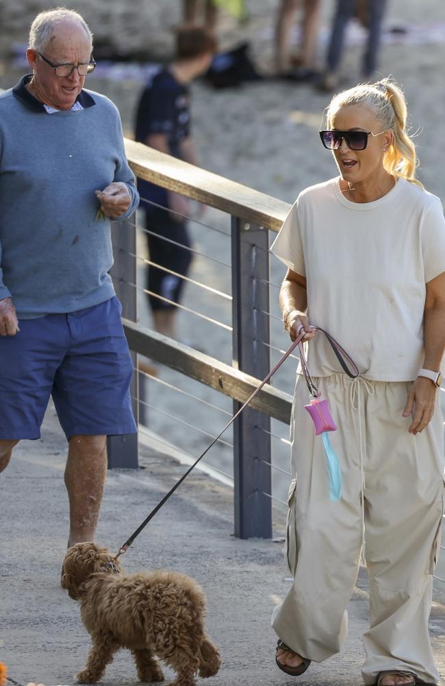 Jackie “O” Henderson strolled Sydney’s Coogee Beach with her dad Tony and puppy Sadie. Picture: Media Mode