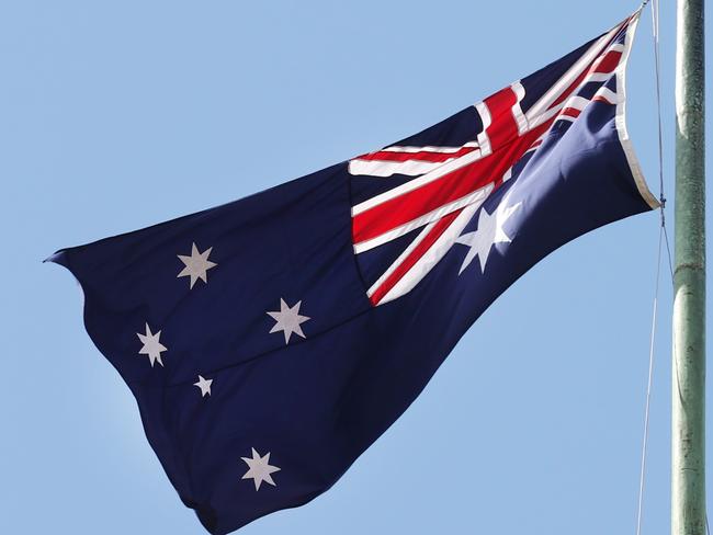 Australian flag at half mast in respect fo the Queens passing but Indigenous flags full mast on Town Hall.                      Picture: David Caird