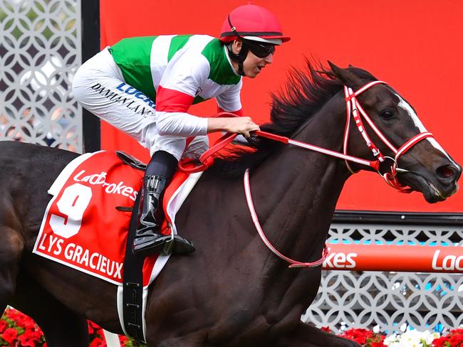 Jockey Damian Lane rides Lys Gracieux to victory in race 9, the Ladbrokes Cox Plate, during Cox Plate Day at Moonee Valley Racecourse, Melbourne, Saturday, October 26, 2019. (AAP Image/Vince Caligiuri) NO ARCHIVING, EDITORIAL USE ONLY