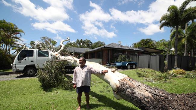 Residents survey the damage at Helensvale caused by wild weather Xmas night. Sonny Kapita stunned by the storm which destroyed his truck. Picture: Glenn Hampson