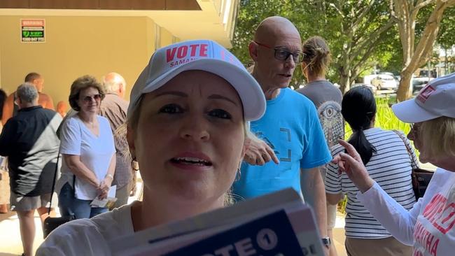 Division 6 Candidate Samantha Delmege smack a reporters recording equipment with her pamphlets. Picture: Mohammad Alfares