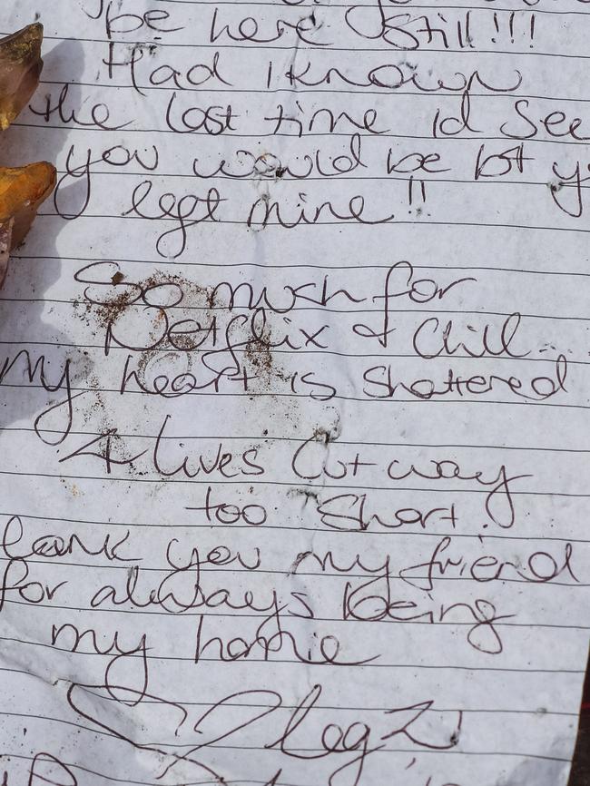 Flowers, Notes and beers left at the site of a Treble fatal accident on Hillier Rd, Howard Springs. Picture: Glenn Campbell