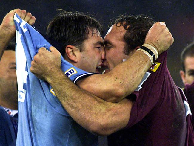 Tallis butts heads with the Blues’ Terry Hill in a famous State of Origin photograph from 1999.