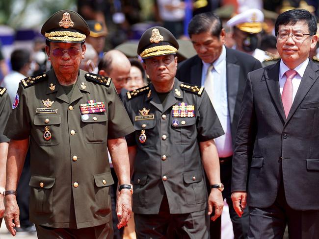 Cambodia's Defence Minister Tea Banh (L) and China's Ambassador to Cambodia Wang Wentian (R) take part in a groundbreaking ceremony at the Ream naval base in Preah Sihanouk province on June 8, 2022. (Photo by Pann Bony / AFP)