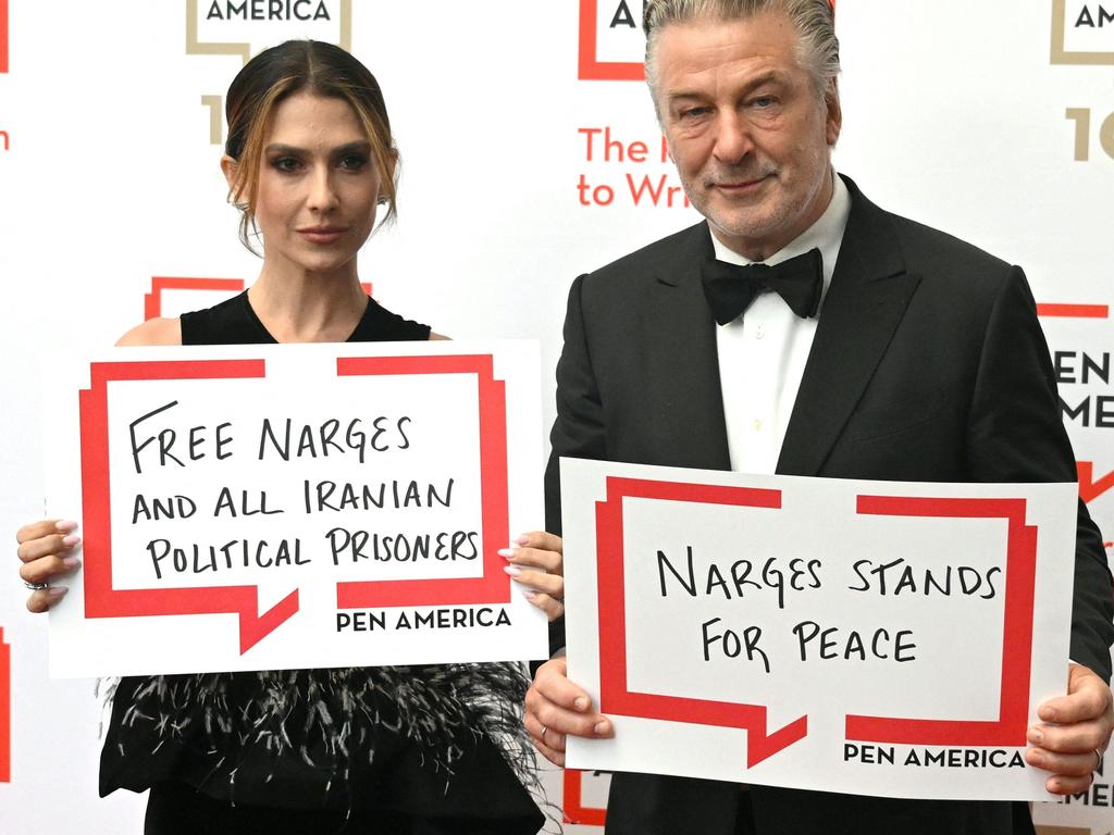 The couple lend their support to the cause. Picture: Timothy A. Clary/AFP