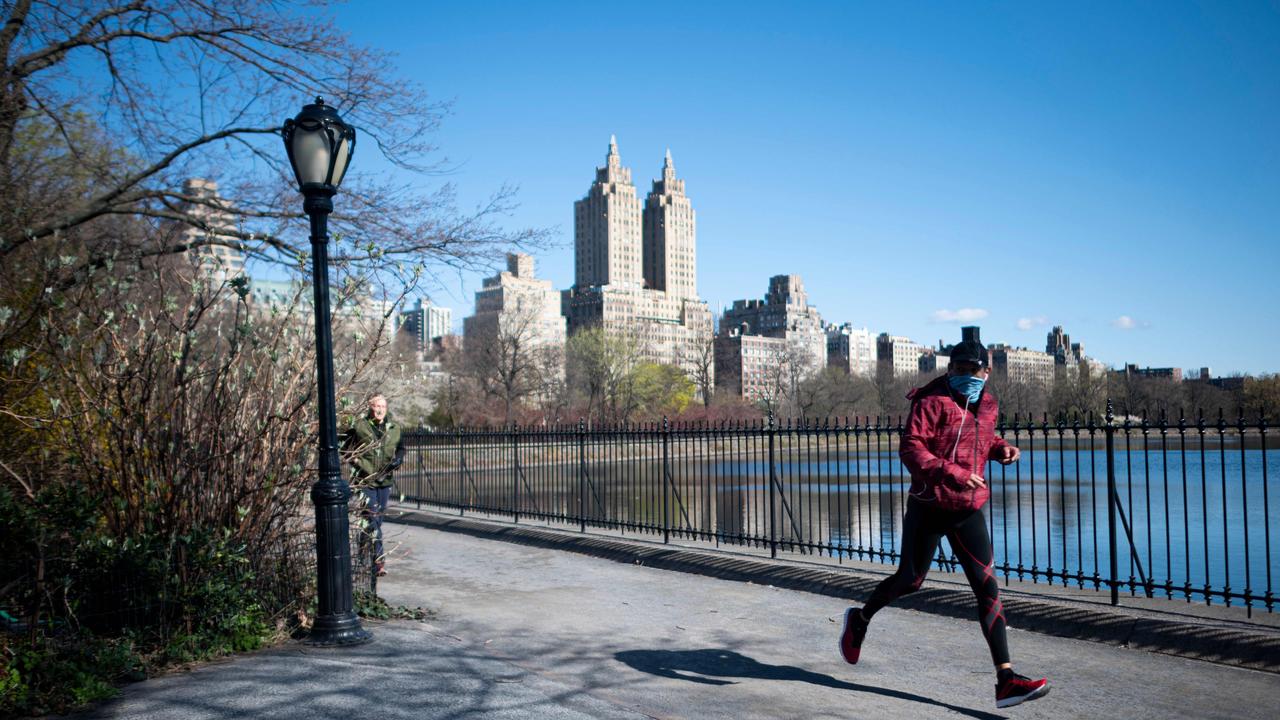 A man jogs in Central Park, New York City on April 11, 2020. Picture: Johannes Eisele / AFP.