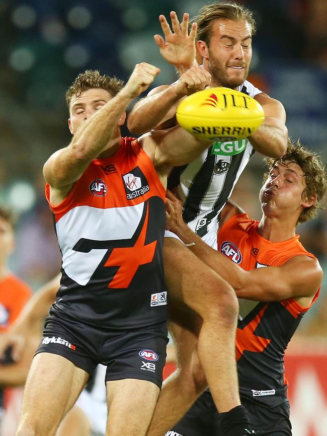 Heath Shaw and Tim Broomhead fly for a mark. Pic: Getty Images