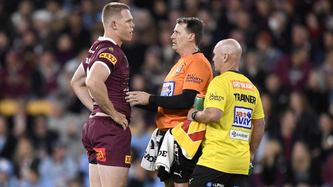 Queensland and Sydney Roosters prop Lindsay Collins receives attention. Picture: NRL Imagery