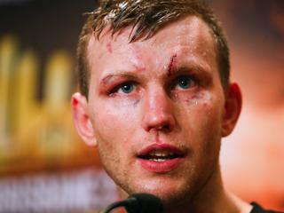 Australian boxer Jeff Horn speaks to the media following his World Boxing Organisation welterweight title victory against English boxer Gary Corcoran at Brisbane Convention Centre in Brisbane on December 13, 2017. Australian Jeff Horn retained his World Boxing Organisation welterweight title with an 11th round TKO win over English challenger Gary Corcoran in Brisbane on December 13. / AFP PHOTO / Patrick HAMILTON / -- IMAGE RESTRICTED TO EDITORIAL USE - STRICTLY NO COMMERCIAL USE --
