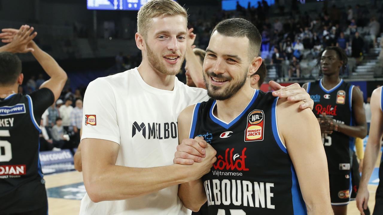 White celebrates with United captain Chris Goulding after the win over Sydney. Picture: Getty Images