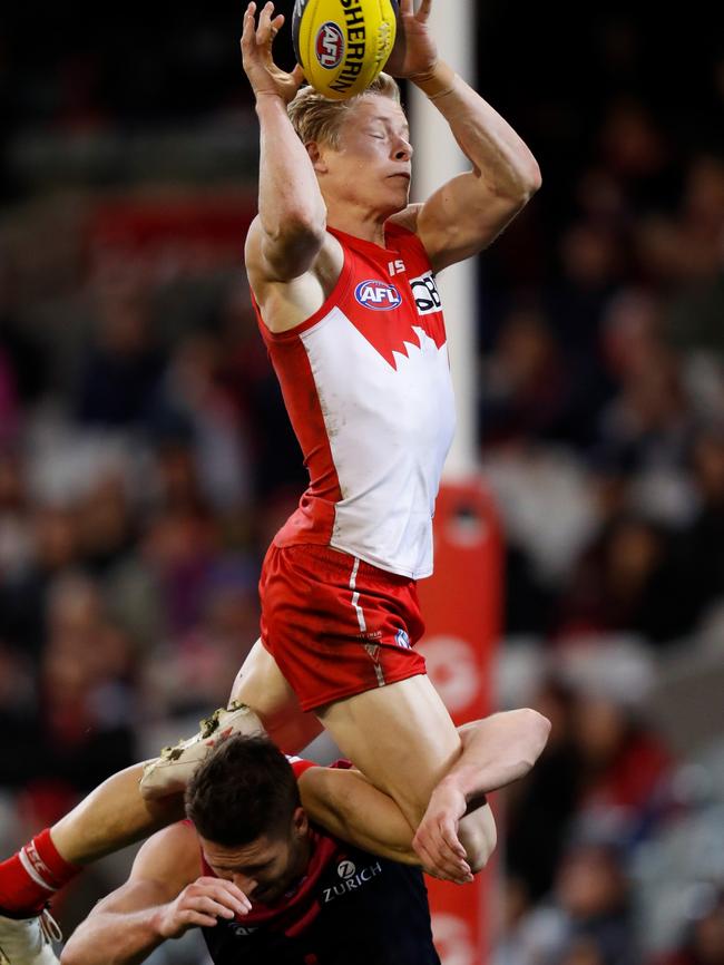 Isaac Heeney soars over Jesse Hogan. Picture: AFL Media