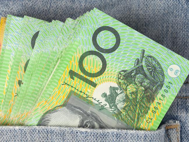 Australian 100 dollar notes in jeans pocket. money, wealthy, rich generic