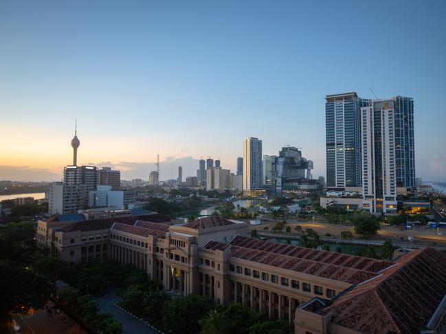 The break of dawn over new infrastructure developments in the capital, Colombo, with the Presidential Secretariat in the foreground. Picture: Abhishek Chinnappa / Getty Images