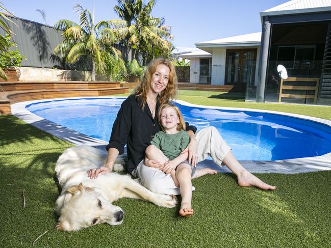 Pictures of Rosie  Zieba and  husband recently sold their home and have bought back into the east coast property market. Perth is one of the locations that enjoyed a surge in prices, in Ocean Reef,  Perth.Pictures of Rosie with Roman (3) with Aura the golden retriever next to their pool in their backyard.