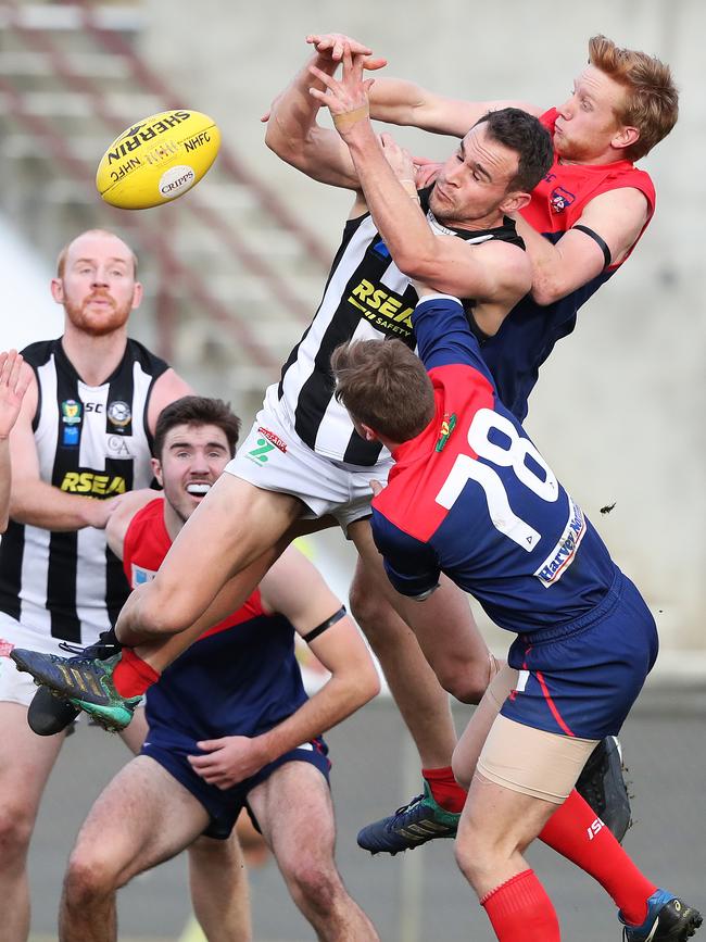 Jaye Bowden flies for a mark against North Hobart last year. Picture: NIKKI DAVIS-JONES