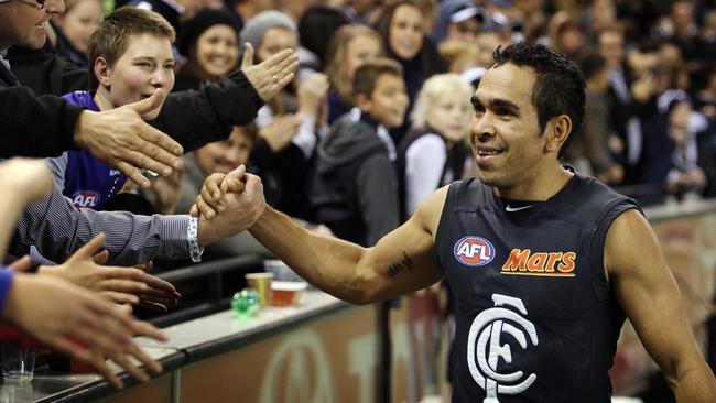 Eddie Betts celebrates with Carlton fans after a win against Western Bulldogs.