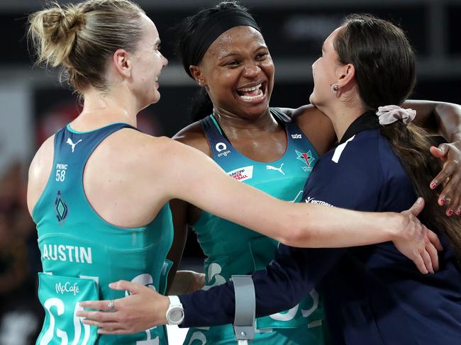 MELBOURNE, AUSTRALIA - MARCH 26: Mwai Kumwenda of the Vixens celebrates with Kiera Austin of the Vixens and Rahni Samason of the Vixens during the round two Super Netball match between Collingwood Magpies and Melbourne Vixens at John Cain Arena, on March 26, 2023, in Melbourne, Australia. (Photo by Kelly Defina/Getty Images)