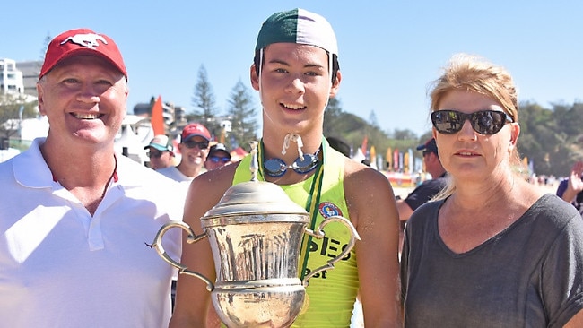 Hugh Monroe with the parents of Matthew Barclay at the Australian surf lifesaving titles. Pic: Harvie Allison