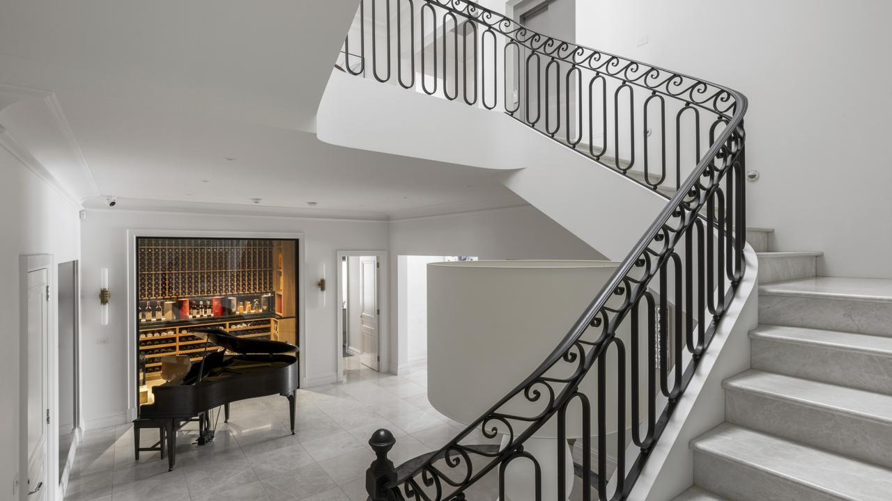 Inside one of Melbourne’s most lavish mansion’s on the market at the moment with a marble foyer and plus carpets throughout.