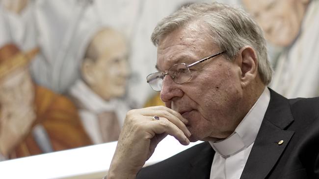 Cardinal George Pell attends a press conference at the Vatican Radio headquarters, in Rome, Tuesday, March 31, 2015. The Vatican finance minister has said he hopes to avoid financial scandal with the upcoming Jubilee year, saying the plans will be subject to new Vatican procedures to ensure they follow international standards for transparency and accountability. Cardinal George Pell outlined the Vatican's financial reform during a conference Tuesday to launch a book on better managing church assets, a priority for Pope Francis after years of financial scandal and mismanagement at the Holy See. (AP Photo/Andrew Medichini)