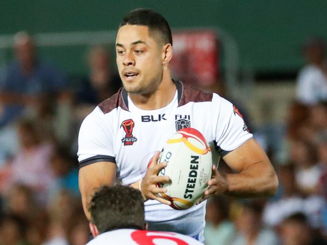 Jarryd Hayne of Fiji looks to pass the ball during the game 4 match of the Rugby League World Cup between Fiji and USA at Townsville Stadium in Townsville, Saturday, October 28, 2017. (AAP Image/Michael Chambers) NO ARCHIVING, EDITORIAL USE ONLY