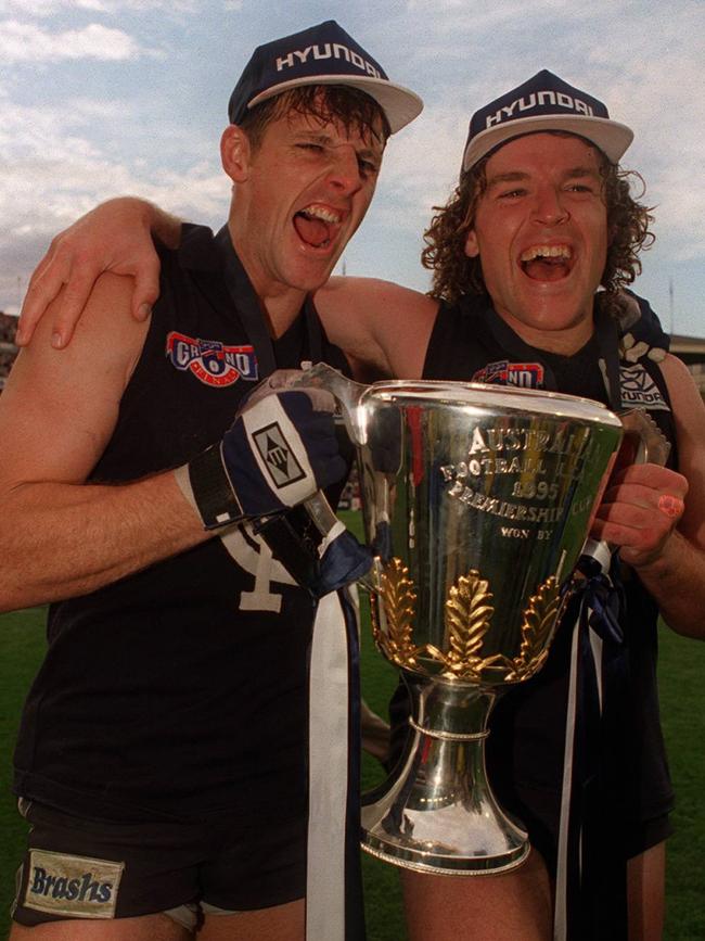 Peter Dean and Fraser Brown celebrate the 1995 premiership.