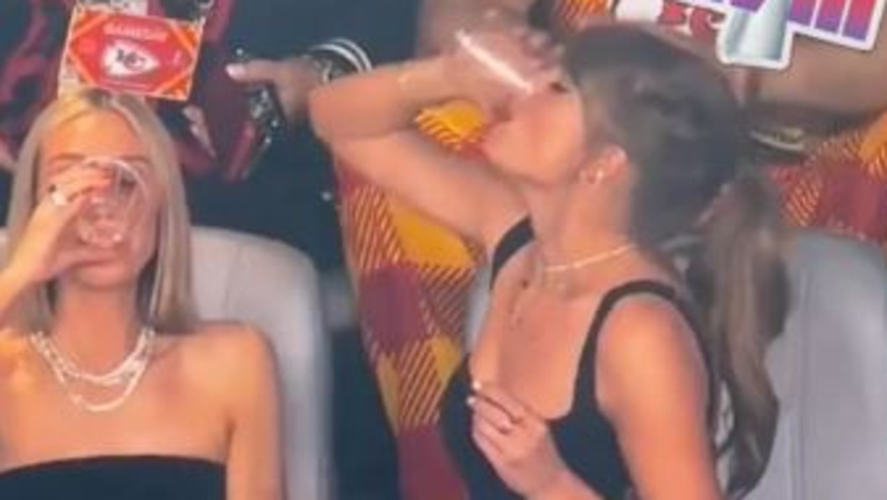 Taylor Swift takes a drink at the Super Bowl. Picture: Supplied