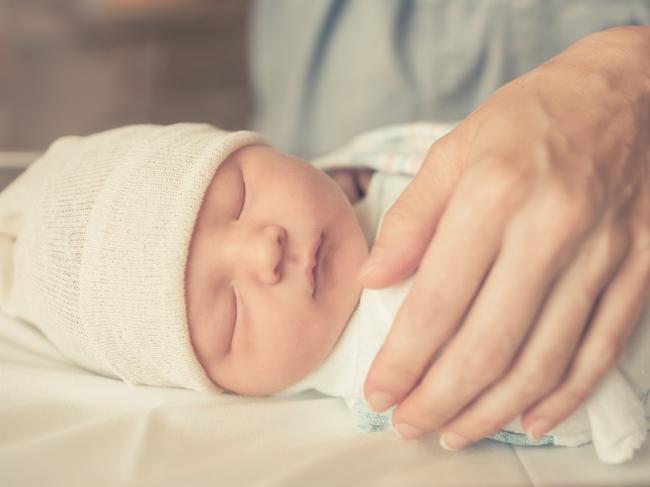 Newborn baby sleeping in the hospital.