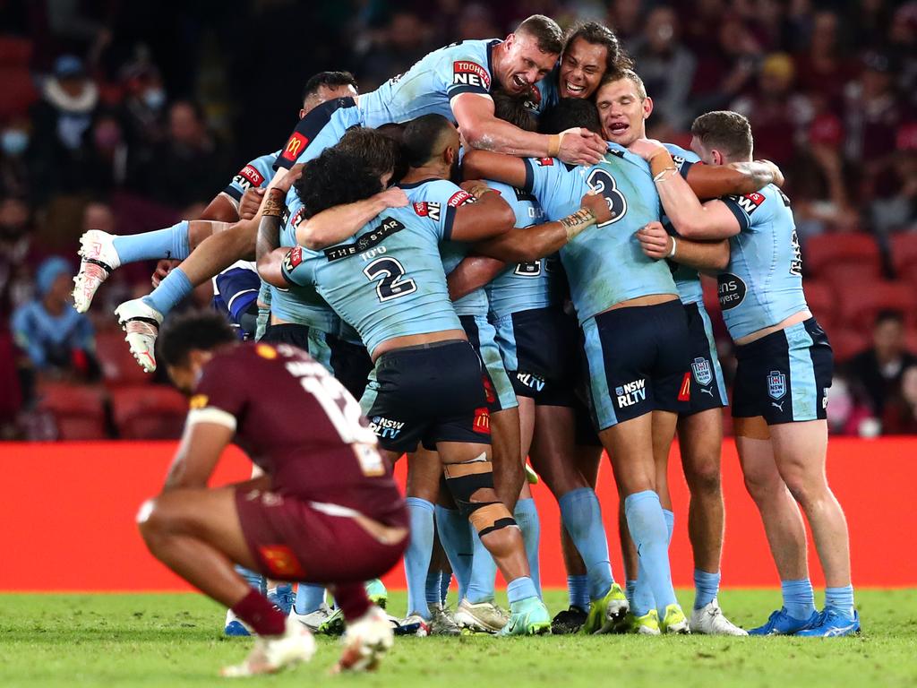 The Blues celebrate winning game two of the 2021 State of Origin series and the pain sets in for Queensland – as it should. It’s not time for being matey. Picture: Chris Hyde/Getty Images