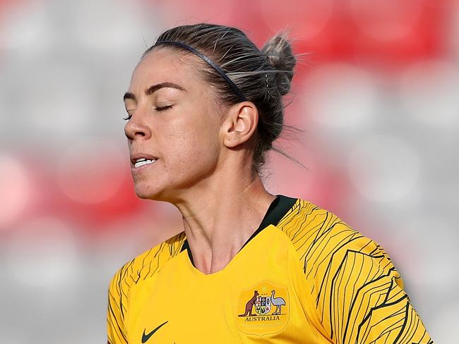 AMMAN, JORDAN - APRIL 17: Alanna Kennedy of Australia reacts during the AFC Women's Asian Cup semi final between Australia and Thailand at the King Abdullah II Stadium on April 17, 2018 in Amman, Jordan.  (Photo by Francois Nel/Getty Images)