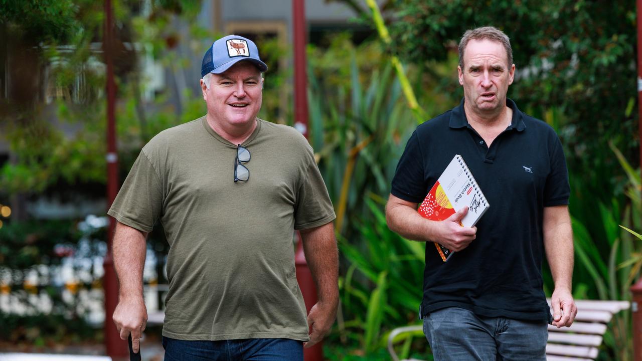 Former cricketer Stuart MacGill, left, in Cremorne was seen out for coffee with a friend as he awaits to be sentenced for taking part in the supply of cocaine. Picture: Justin Lloyd.