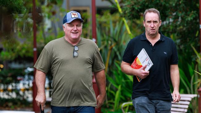 Former cricketer Stuart MacGill, left, in Cremorne was seen out for coffee with a friend as he awaits to be sentenced for taking part in the supply of cocaine. Picture: Justin Lloyd.