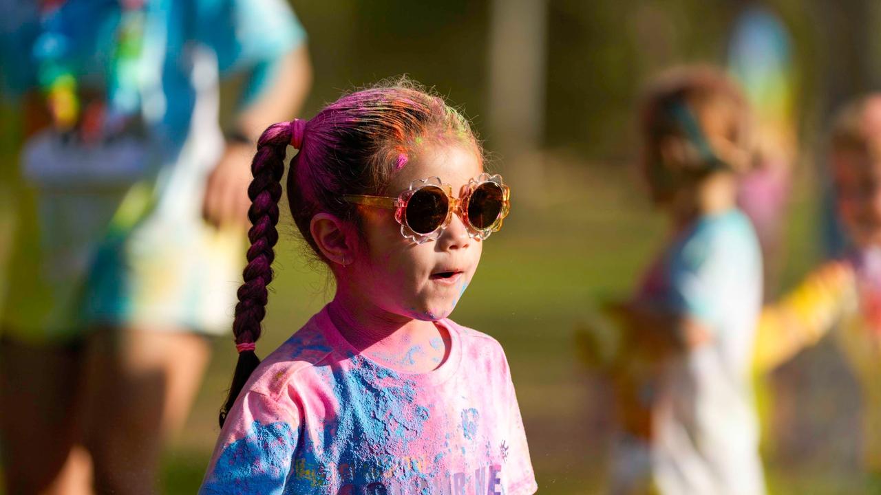 Photos from Cherryandjun Photography of the 2023 Gladstone Colour Me Capricorn fun run for the RACQ CapRescue.