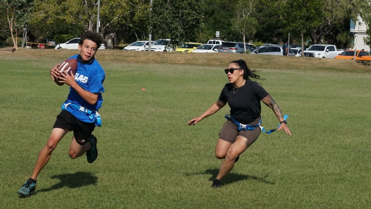 Darwin Middle School students playing Flag Football against United States Marines at DMS, 19 May 2025. Picture: Jason McIntosh