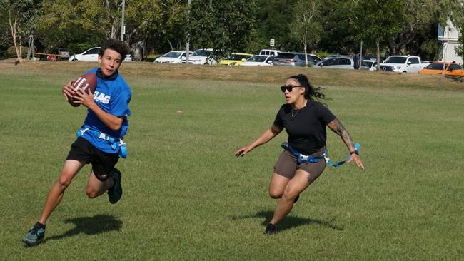 Darwin Middle School students playing Flag Football against United States Marines at DMS, 19 May 2025. Picture: Jason McIntosh