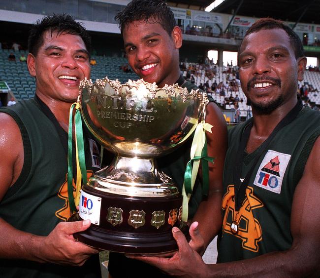 2003 Grand Final – St Marys v Palmerston – Cyril Rioli Jr, Randall Rioli and Willie Rioli Jr celebrating St Marys’ 2003 grand final win over Palmerston. Picture: Michael Marschall