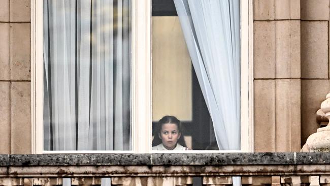 Princess Charlotte of Cambridge looks out the window during the Platinum Pageant. (Photo by Leon Neal - WPA Pool/Getty Images)