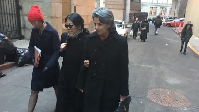 Sheri Yan (centre) in New York in 2016 before pleading guilty to bribery.