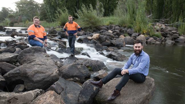 Snowy Hydro employees, from left, Tom Reed, Paul Smith and Evan Bayliss near Cooma yesterday. Picture: Andrew Taylor