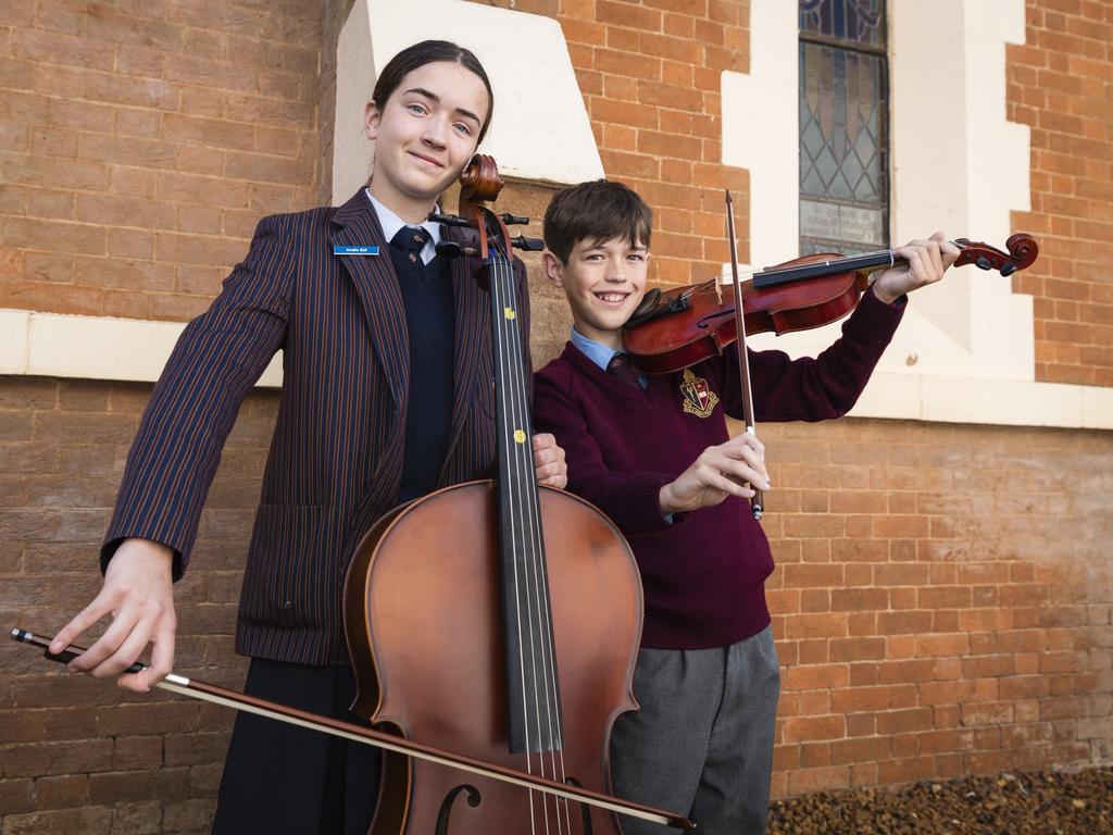 Brother and sister Amelia and Austin Ball before their solo string sections of the 77th City of Toowoomba Eisteddfod at Empire Theatres, Friday, July 28, 2023. Picture: Kevin Farmer