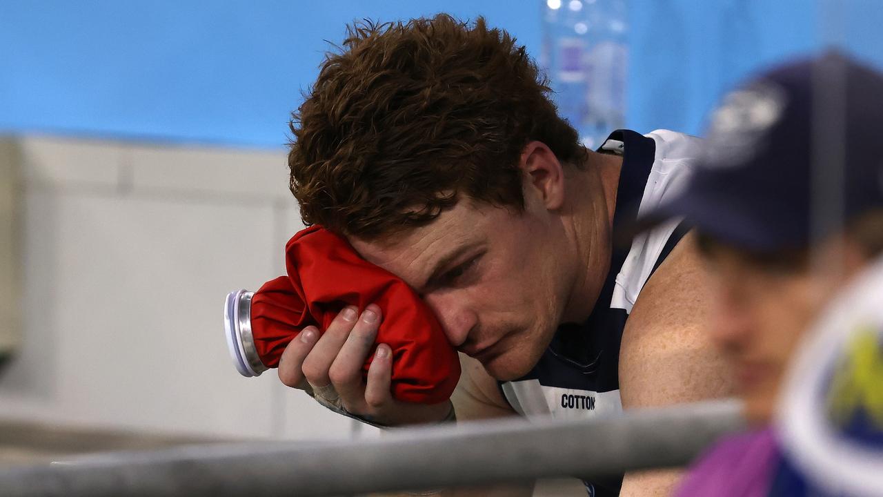 Gary Rohan cut a lonely figure on the Cats’ bench after his prelim shocker. Picture: Getty Images