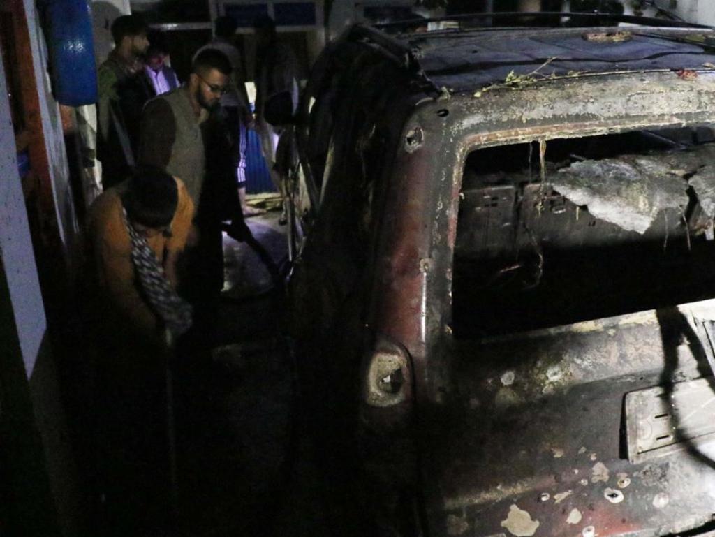 A view of the burnt-out car after a rocket reportedly hit a residential area near Hamid Karzai International Airport. Picture: Haroon Sabawoon/Anadolu Agency via Getty Images