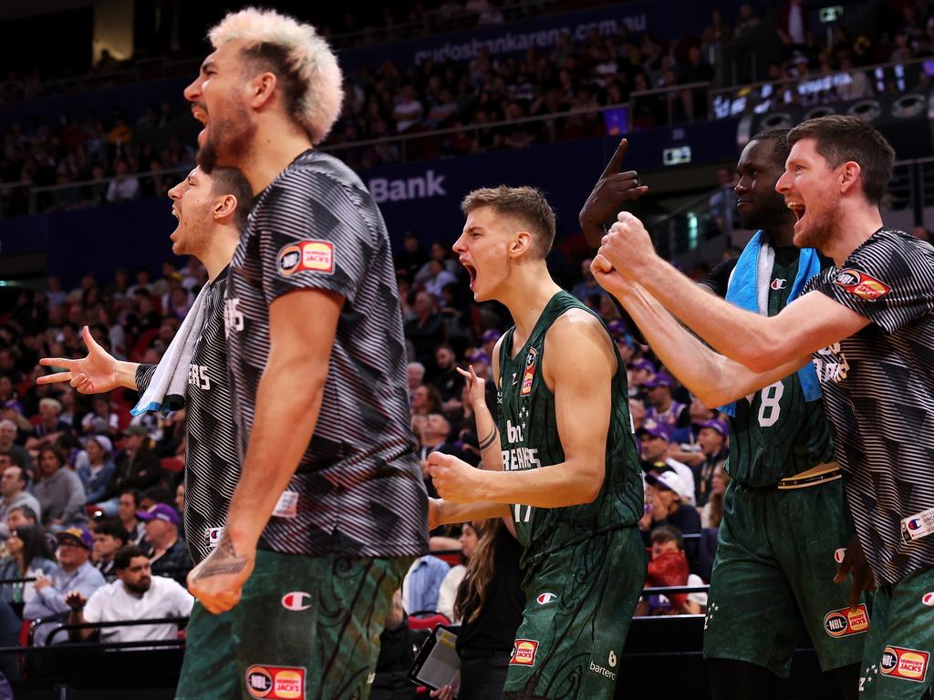 The Breakers bench rises as one. Picture: Mark Kolbe/Getty Images