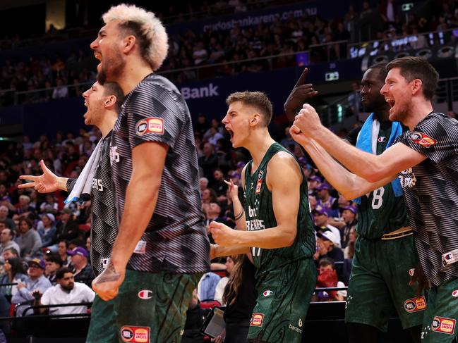 The Breakers bench rises as one. Picture: Mark Kolbe/Getty Images