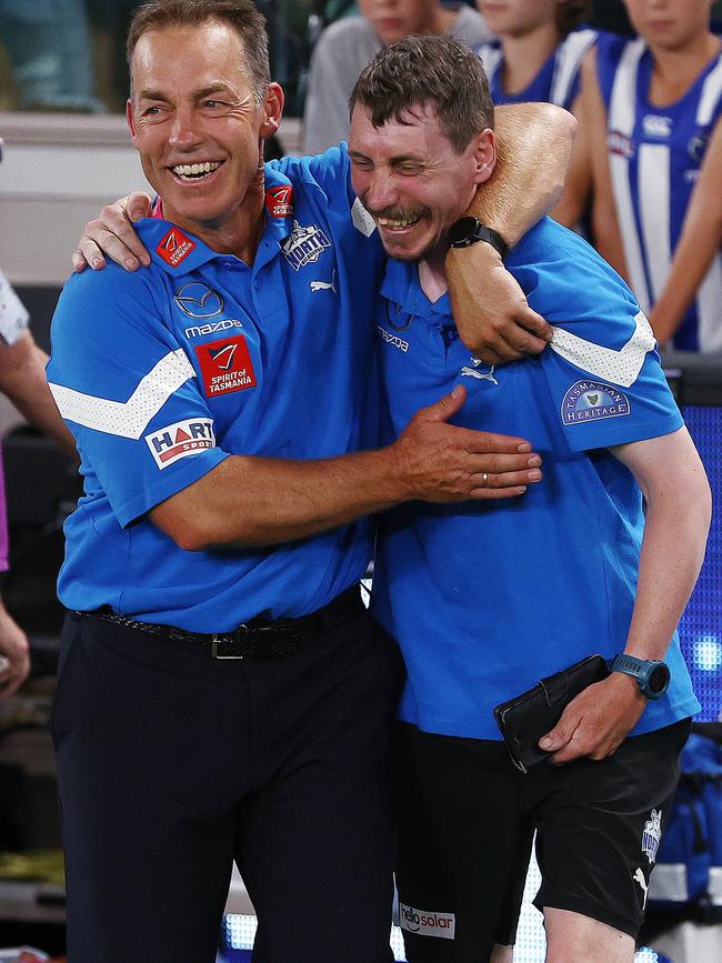 Alastair Clarkson hugs his nephew Tom. Picture: Michael Klein