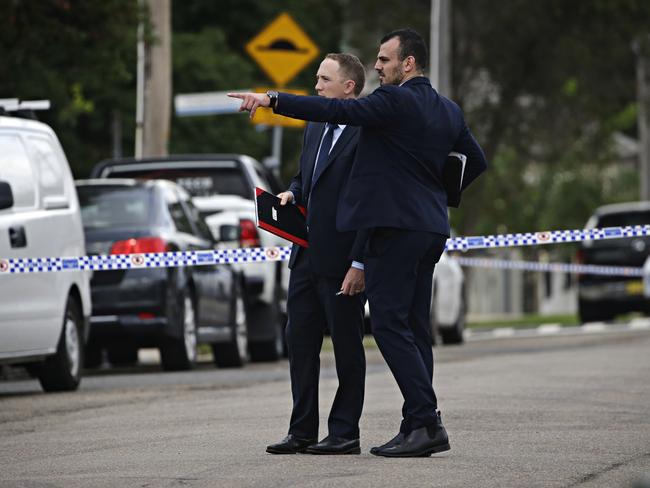 Detectives on the scene of a house shooting in Guilford on the 12th of March. Picture: Adam Yip