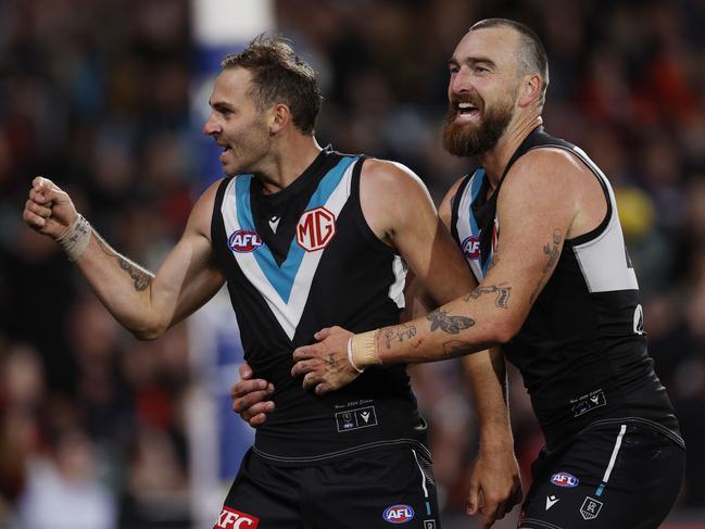 MELBOURNE , AUSTRALIA. April 5, 2024.  AFL Gather Round. Round 4.  Port Adelaide vs Essendon at the Adelaide Oval.   Jeremy Finlayson of the Power celebrates a 4th quarter goal with Charlie Dixon   . Pic: Michael Klein