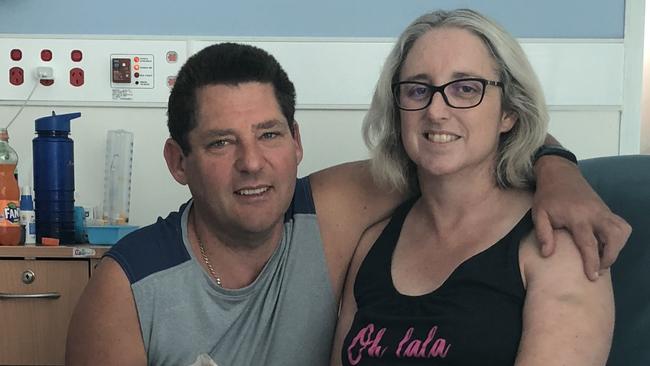 Tasmanian shark attack victim Justine Barwick, pictured in hospital with husband Craig, was heading home today.